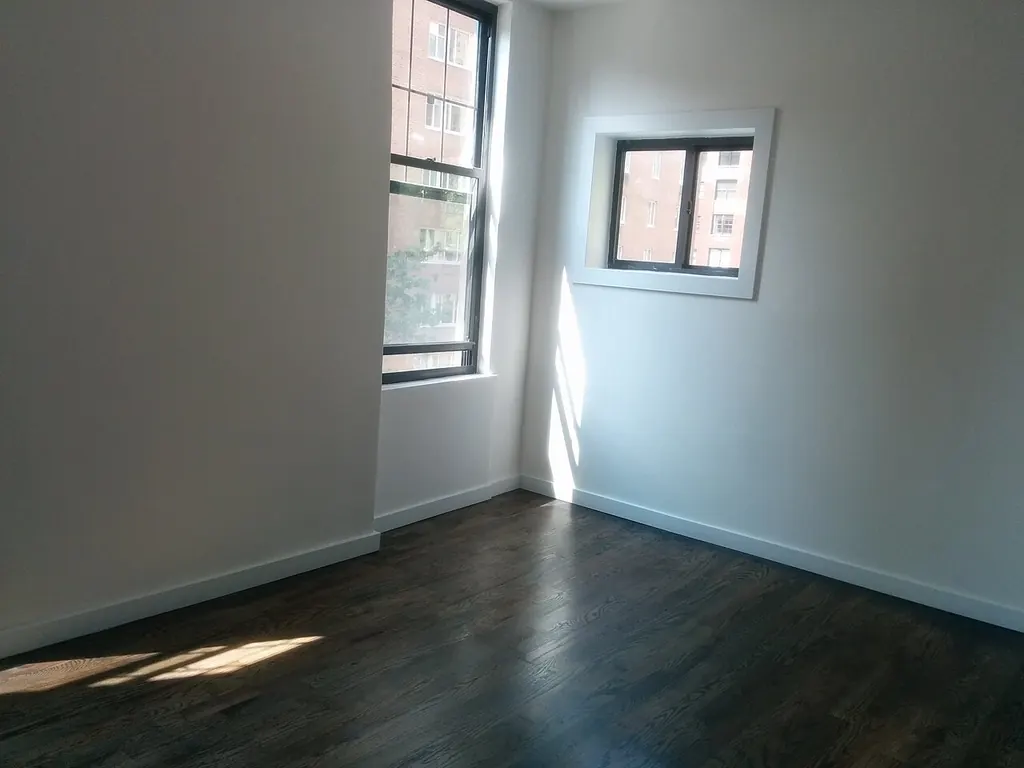 Apartment still tense after neighbors leave — an empty room (Wikimedia Commons)