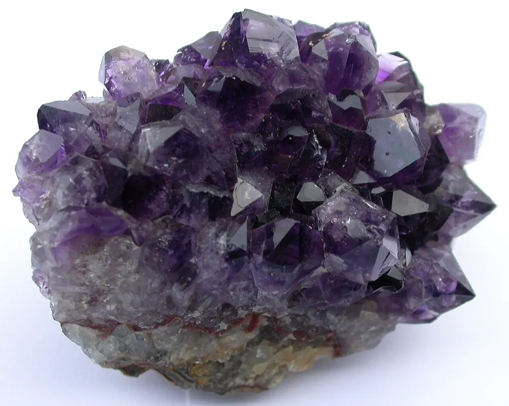 Selenite vs other crystals — an amethyst cluster (Wikimedia Commons)