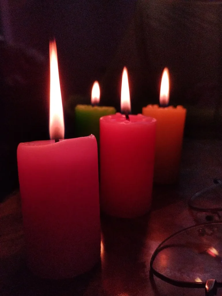 Rebuilding a home aura shield — a group of lit candles (Wikimedia Commons)